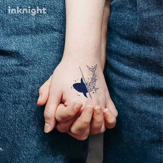 Geometric whale temporary tattoo on hand – waterproof herbal ink body art